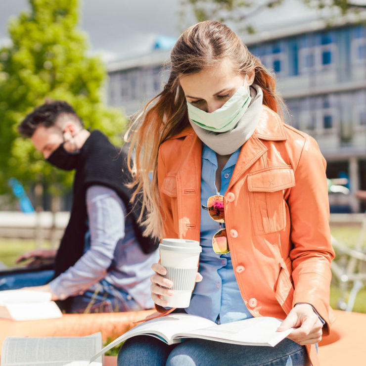 College Students Wearing Masks And Staying Distant During Covid