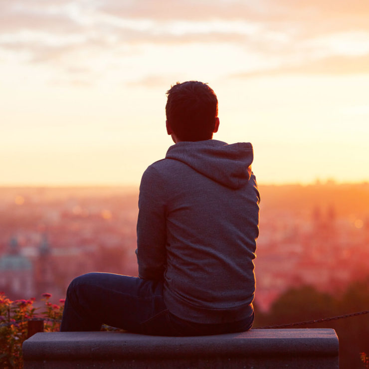 Person Looking Out Over A City