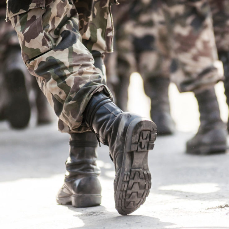 Military boots moving by ChrisSuperseal via iStockPhoto