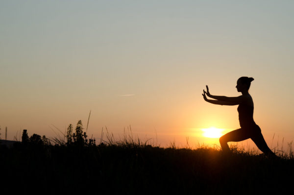 Silhouette Of Woman Tai Chi