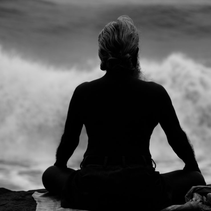 Photo of shadow of woman meditating by Nadir Hashmi via Flickr