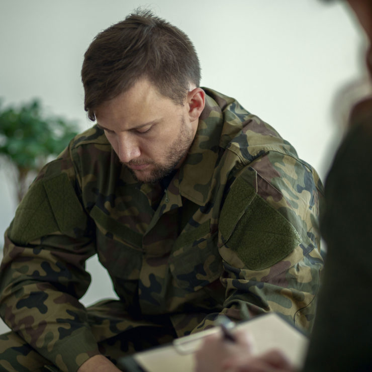 Veteran Talking To Therapist Seeking Mental Health Treatment