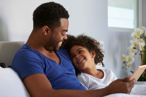 Dad Child Reading Smiling Monkey Business Images I Stock