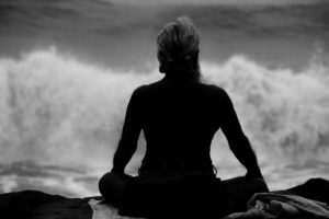 Photo of shadow of woman meditating by Nadir Hashmi via Flickr